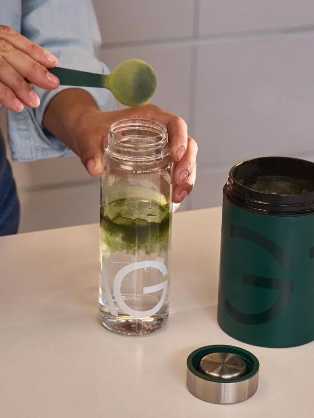 AG1 Athletic Greens Clear Water Bottle Shaker and Sample Pack